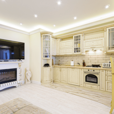 white kitchen with fireplace